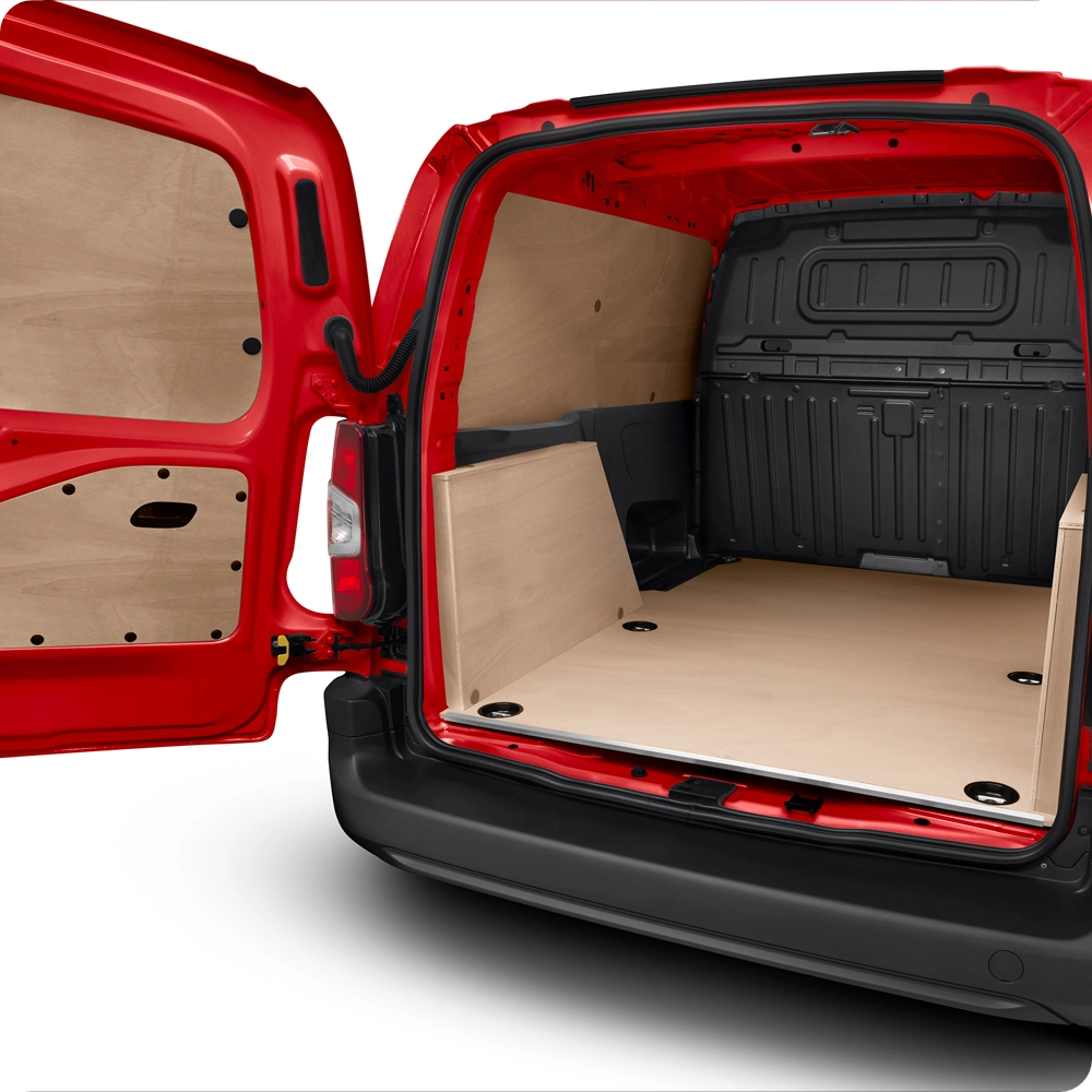 Rear cargo area of a Citroën Berlingo Van fitted with a load protection kit, highlighting interior cargo protection.