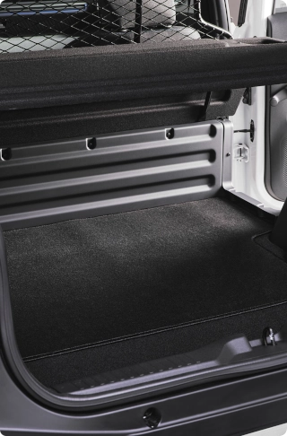 Nahaufnahme des Citroën ë-C3 Van Laderaums, die den praktischen Stauraum und die schützende Innenverkleidung hervorhebt.