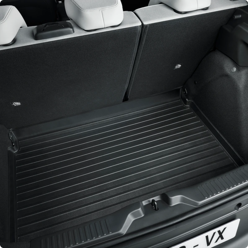 Close‑up boot view showing Citroën ë‑C3 Aircross cargo tray for durable, protective and affordable everyday luggage management.