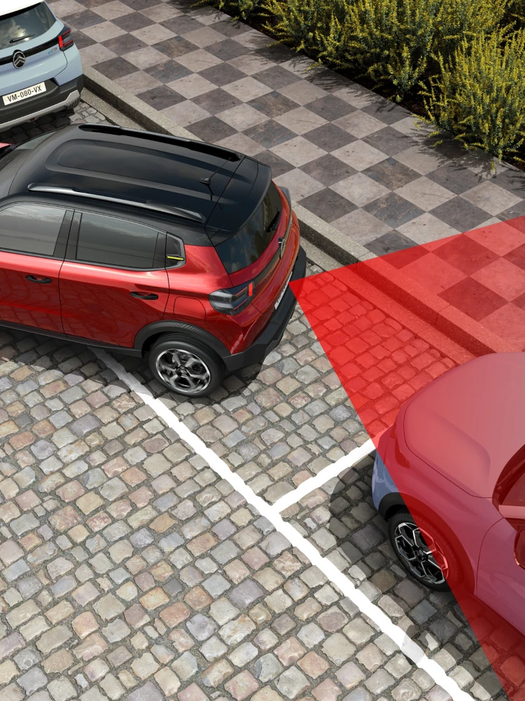 Draufsicht auf den Citroën ë-C3 Elektro-SUV zeigt hintere Parksensoren für sichereres, selbstbewusstes und erschwingliches städtisches Manövrieren.