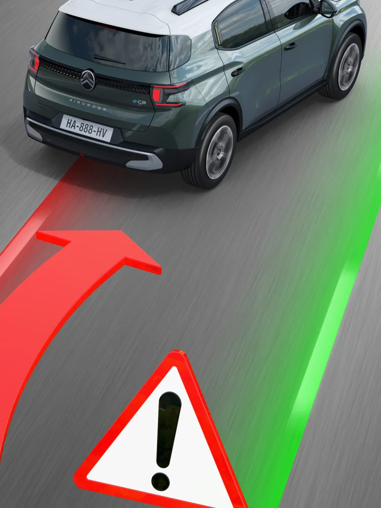 Citroën SUV zeigt Spurverlassenswarnung mit projizierten roten und grünen Spurvisualisierungen auf der Straße.