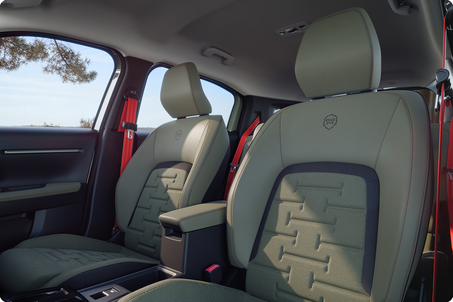 Nahaufnahme der Rücksitze des Citroën C3 Aircross Outdoor mit roten Sicherheitsgurten – Komfort, Geräumigkeit und erfrischendes Design für alle.